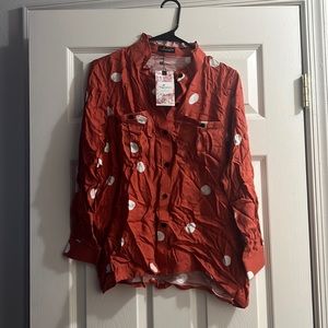 Sorry about the wrinkles selling a Medium Jabihas in new condition never worn